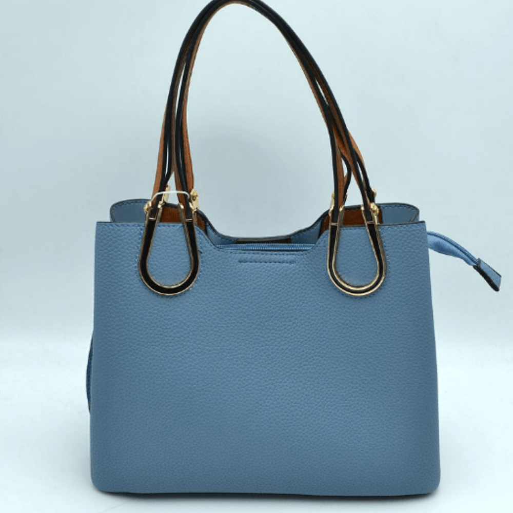 The Everyday Icon: Style 5221 Multi-Pocket Handbag at Helen Ainson in Darien CT 06820