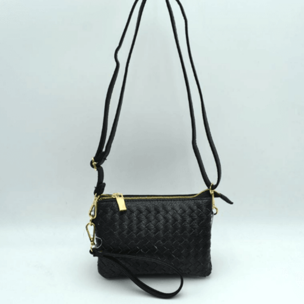 Style TD-0004 Crossbody Bag at Helen Ainson Triple the Organization Never dig for your keys or lipstick again. As seen in Screenshot 2026-06-13 150712.png, this bag features an ultra-functional triple-compartment design. It includes: Two spacious outer zipper sections to keep your bulkier essentials separated.